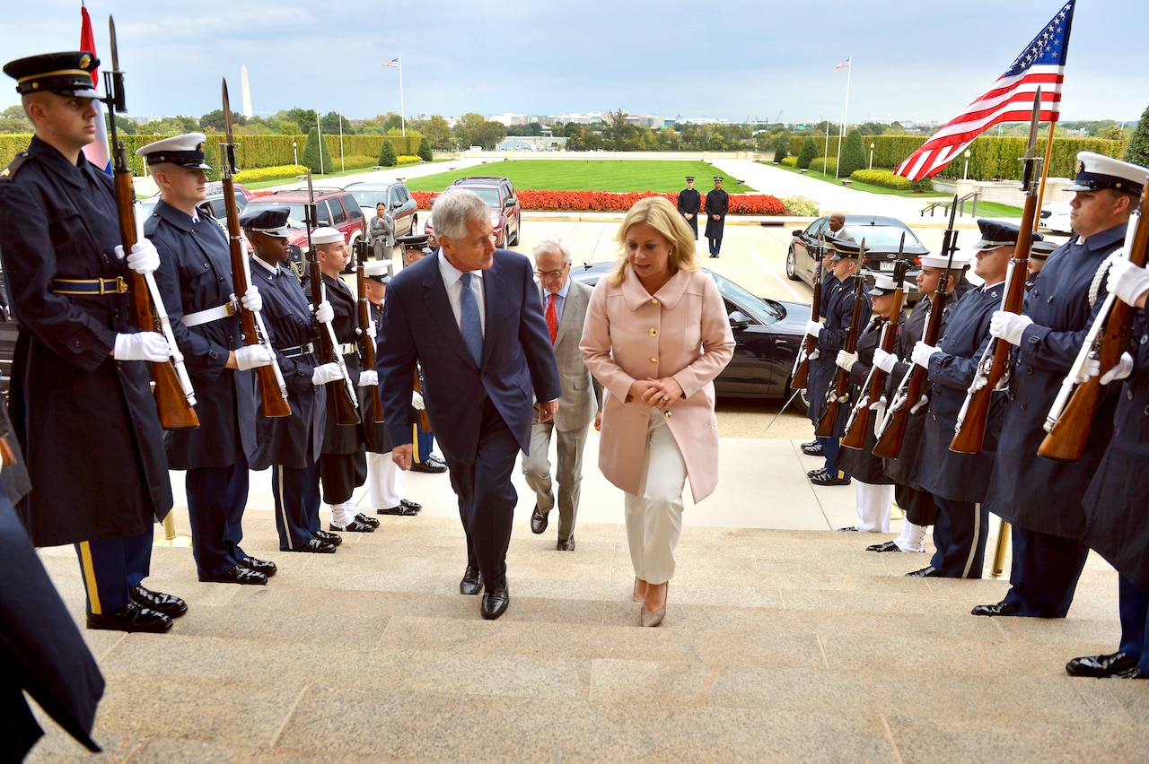U.S. Defense Secretary Chuck Hagel hosts an honor cordon to welcome Dutch Defense Minister Jeanine Hennis-Plasschaert to the Pentagon, Oct. 7, 2014.  DoD photo by Glenn Fawcett
