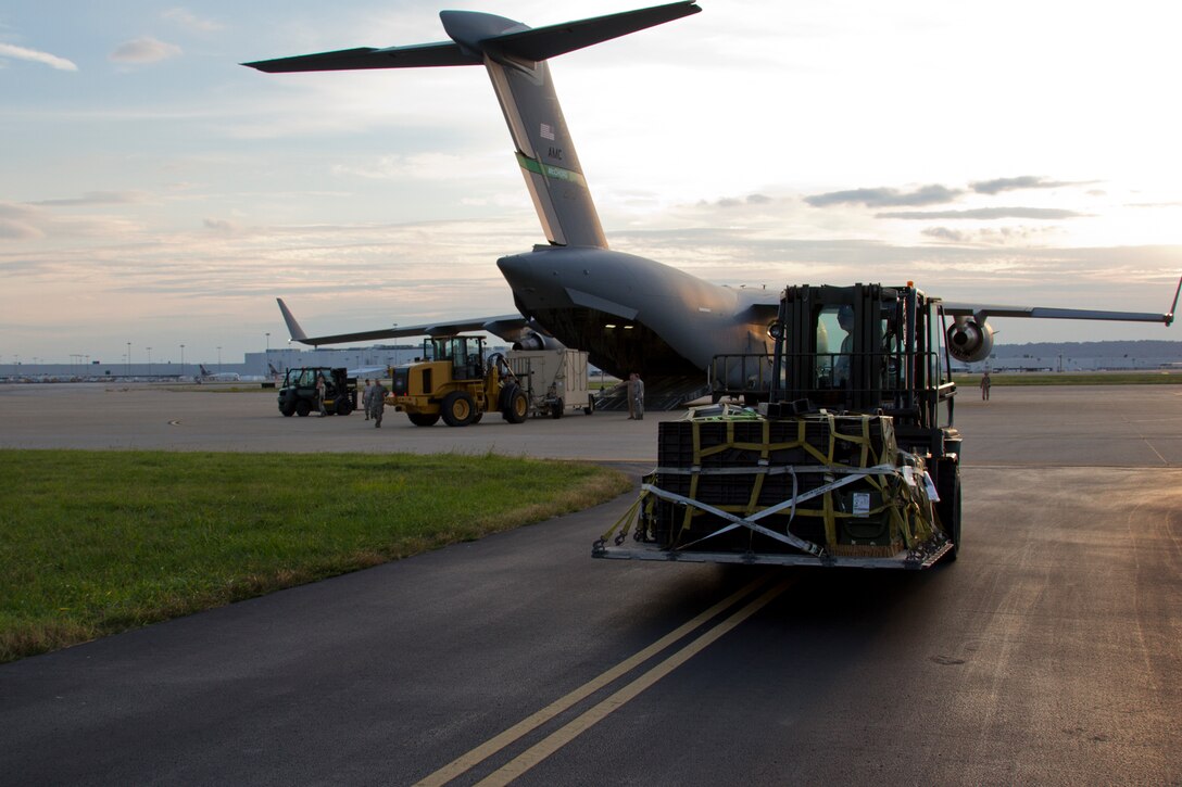Airmen from the Kentucky Air National Guard Base in Louisville, Ky., prepare for deployment to West Africa, Oct. 2, 2014.