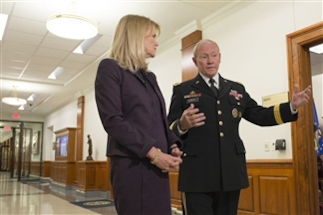 Army Gen. Martin E. Dempsey, right, chairman of the Joint Chiefs of Staff, speaks with Martha Raddatz, ABC News senior foreign affairs correspondent, during a recorded interview at the Pentagon, Oct. 7, 2014. Dempsey answered questions on topics ranging from the ongoing war against Islamic State of Iraq and the Levant in Syria and Iraq to the U.S. military's role in fighting the Ebola virus outbreak in western Africa.