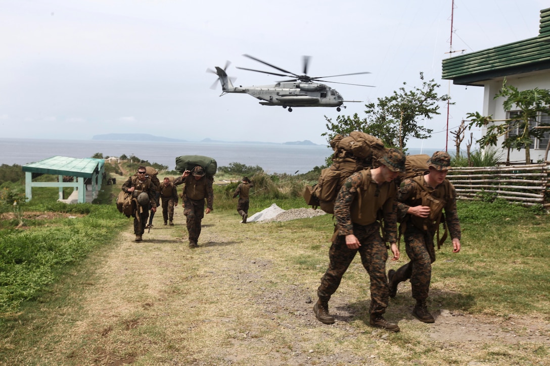 U.S. Marines exit a CH-53E Super Stallion helicopter as part of Amphibious Landing Exercise 15, Oct. 4, 2014. PHIBLEX is an annual, bilateral training exercise conducted by members of the Armed Forces of the Philippines alongside U.S Marine and Navy forces focused on strengthening the partnership and relationships between the two nations across a range of military operations including disaster relief and complex expeditionary operations. The pilots and crew are with Marine Medium Tiltrotor Squadron 262 (Reinforced), and the Marines are with Battalion Landing Team 3rd Battalion, 5th Marine Regiment, both with the 31st Marine Expeditionary Unit. 