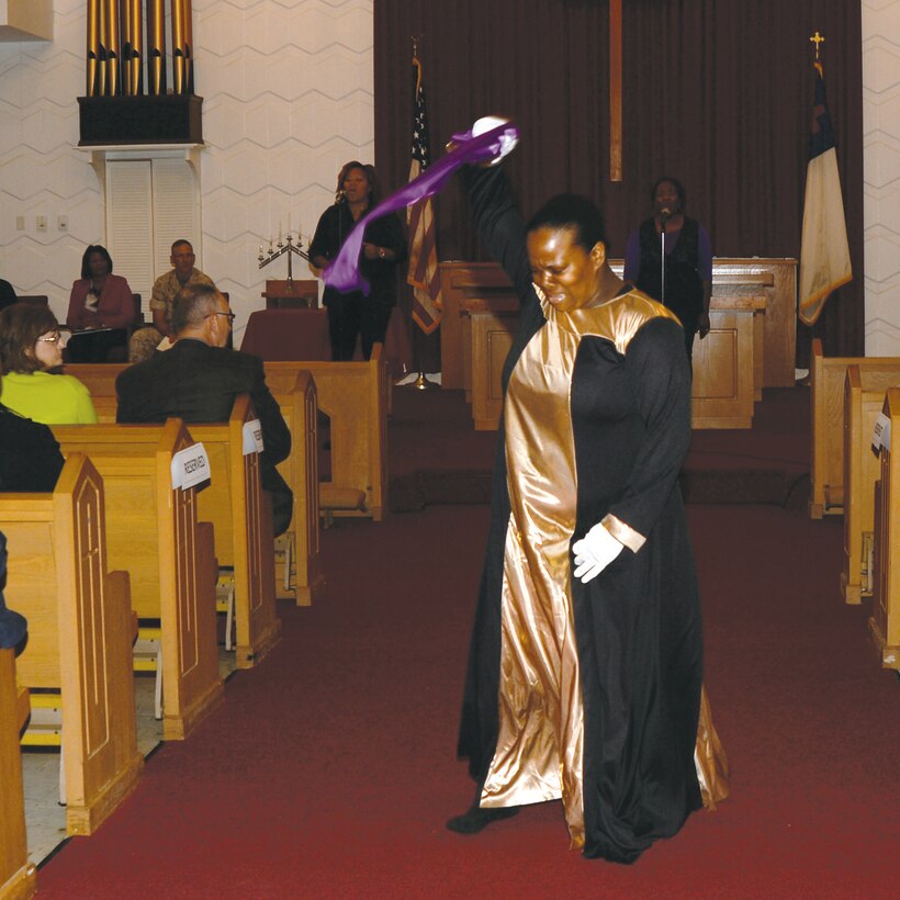 Praise Dancer Esheka Harper performs to the song entitled, “Tired,” by Kelly Price during the Domestic Violence Awareness Proclamation and Motorcycle Ride held Sept. 30 at the Chapel of the Good Shepherd on base.