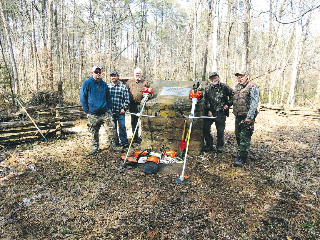 Jeremy Hinson, Mark Curtis, Curtis Lewis, James Kirkman and Andrew Tirch received certificates of appreciation for their clean-up efforts to remove downed trees from the monument site of the second Prince William Courthouse. The recognitions were presented during a Conservation Volunteer Program Meeting Sept. 28 at Prince William National Forest.