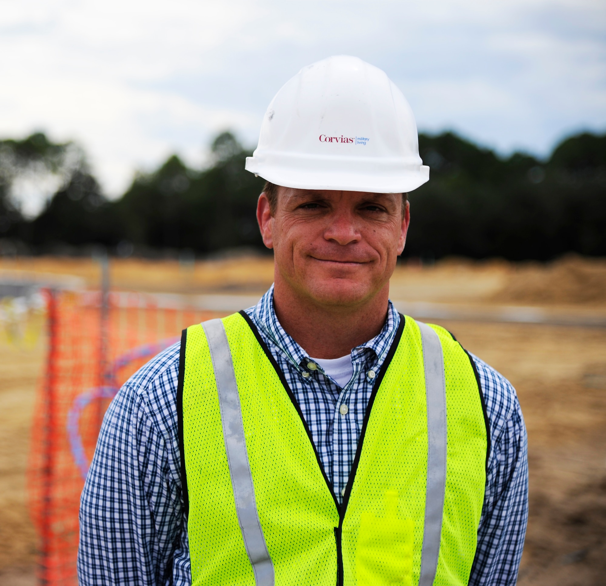 Bob McDonald, director of construction for Corvias Military Living, stands at the construction site of the future Osprey neighborhood on Hurlburt Field, Fla., Oct. 2, 2014. The neighborhood will consist of 63 new single family homes for senior non-commissioned officers and chief master sergeants. (U.S. Air Force photo/Staff Sgt. Sarah Hanson)
