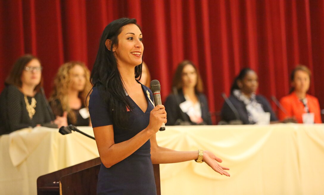 Juliana Mercer, a program manager with Hire America's Heroes, leads a panel discussion during a career symposium for military women in transition at the Pacific Views Events Center here, Oct. 9. More than 200 Marines and Sailors participated in the event, which focused on the unique needs of military women in transition and their career development through workshops and classes.