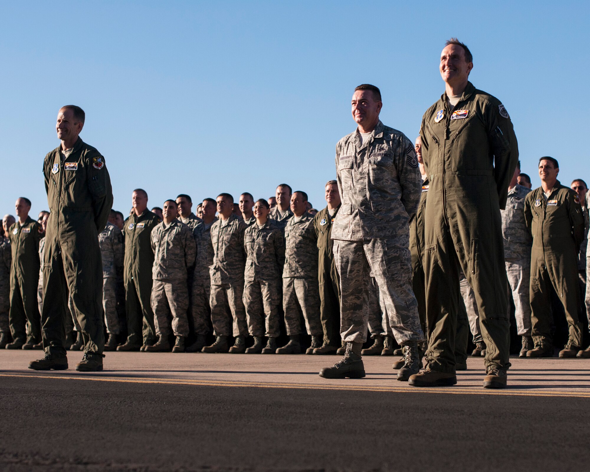 Citizen-Airmen converged at the Tucson International Airport to be captured on digital imagery Oct. 5. “There are plenty of videos of fighter jets in formation or pararescue specialists jumping out of planes that are all stunning visuals,” said Staff Sgt. Dina Farmer, public affairs specialist, “But sometimes, a still picture of Airmen can say a lot as well.” (U.S. Air National Guard photo taken by Staff Sgt. Gregory Ferreira)