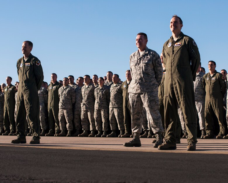 Citizen-Airmen converged at the Tucson International Airport to be captured on digital imagery Oct. 5. “There are plenty of videos of fighter jets in formation or pararescue specialists jumping out of planes that are all stunning visuals,” said Staff Sgt. Dina Farmer, public affairs specialist, “But sometimes, a still picture of Airmen can say a lot as well.” (U.S. Air National Guard photo taken by Staff Sgt. Gregory Ferreira)
