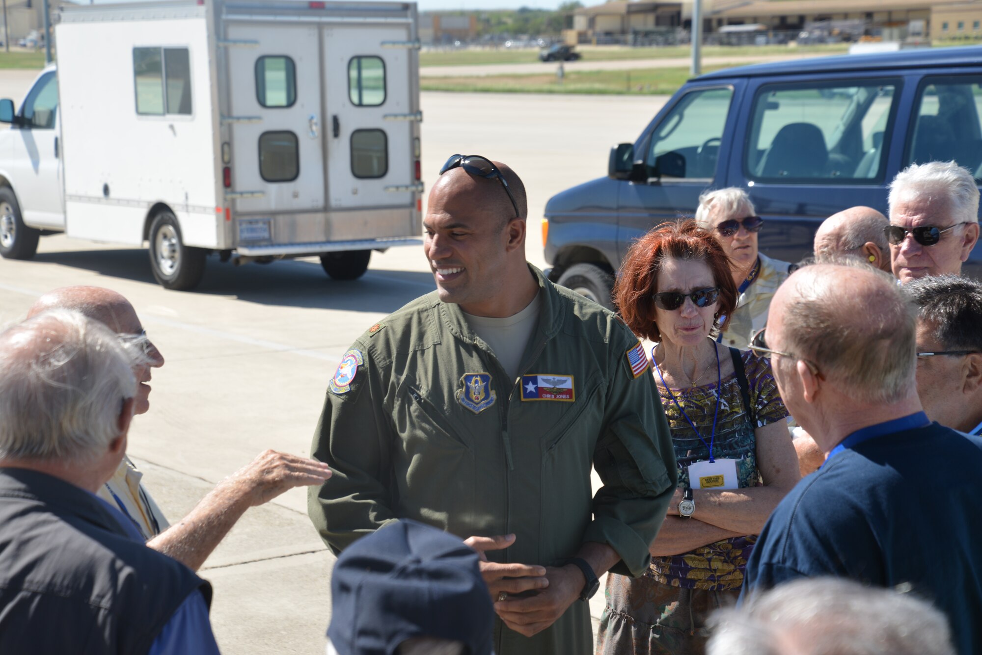 Major Chris Jones, 68th Airlift Squadron, a C-5A pilot briefs Navy veterans of Patrol Squadron Sixteen just prior to a tour of C-5A Galaxy, 3 Oct. 2014, on Joint Base San Antonio-Lackland, Texas. The C-5A Galaxy is one of the largest aircraft in the world, capable of transporting 270,000 pounds. 