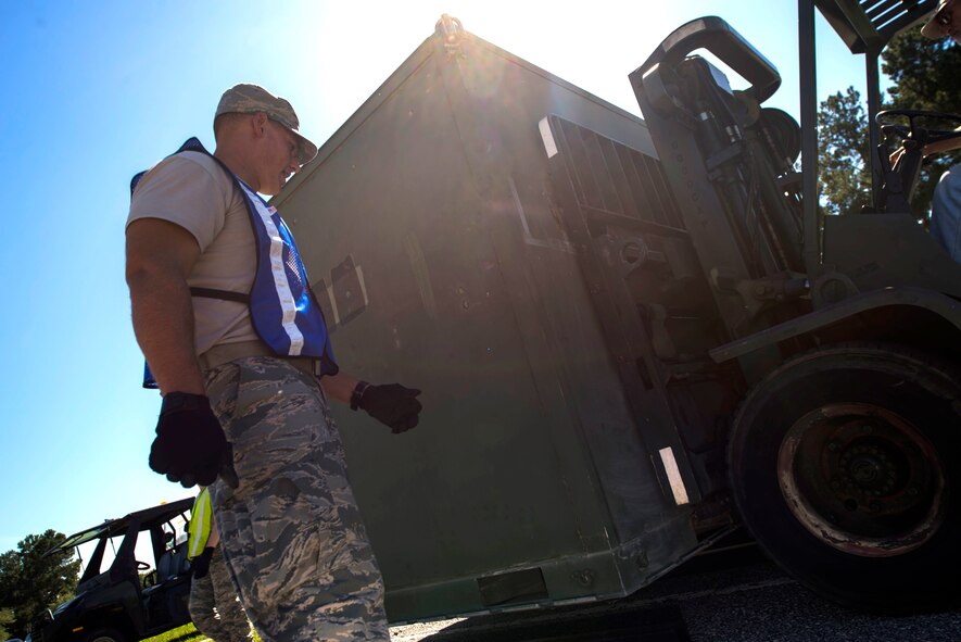 U.S. Air Force Senior Airman Kyle Hatch, 23d Civil Engineer Squadron vehicle equipment specialist, prepares a pallet for shipment during a Wing Readiness Inspection Oct. 6, 2014, at Moody Air Force Base, Ga. The exercise introduced an employment phase, in which Airmen simulated a deployment to  Avon Park Air Force Range, Fla. (U.S. Air Force photo by Airman 1st Class Dillian Bamman/Released)