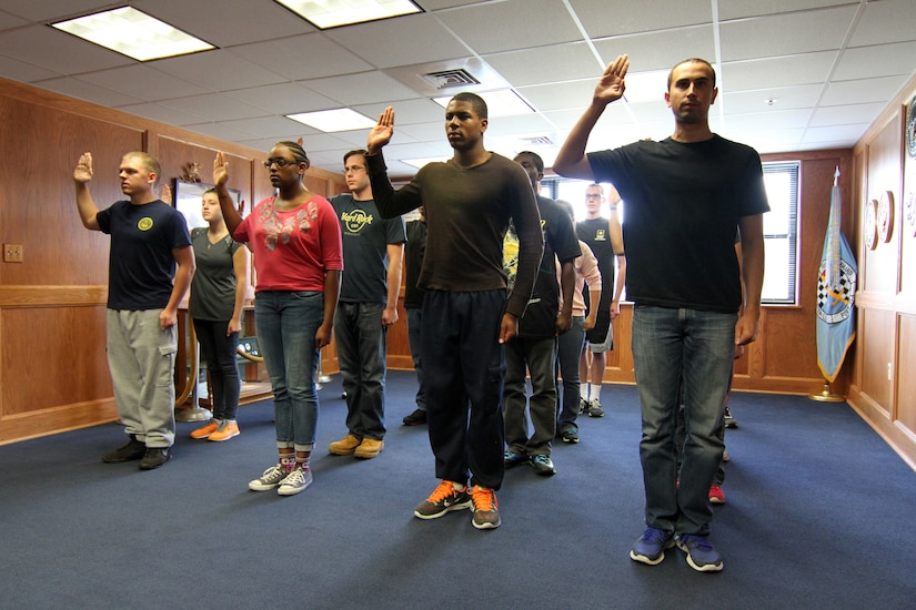 Applicants are sworn into service at the Military Entrance Processing Station on Joint Base McGuire-Dix-Lakehurst, N.J., Oct. 7, 2014. (U.S. Army photo by Sgt. Richard W. Hoppe/Released)