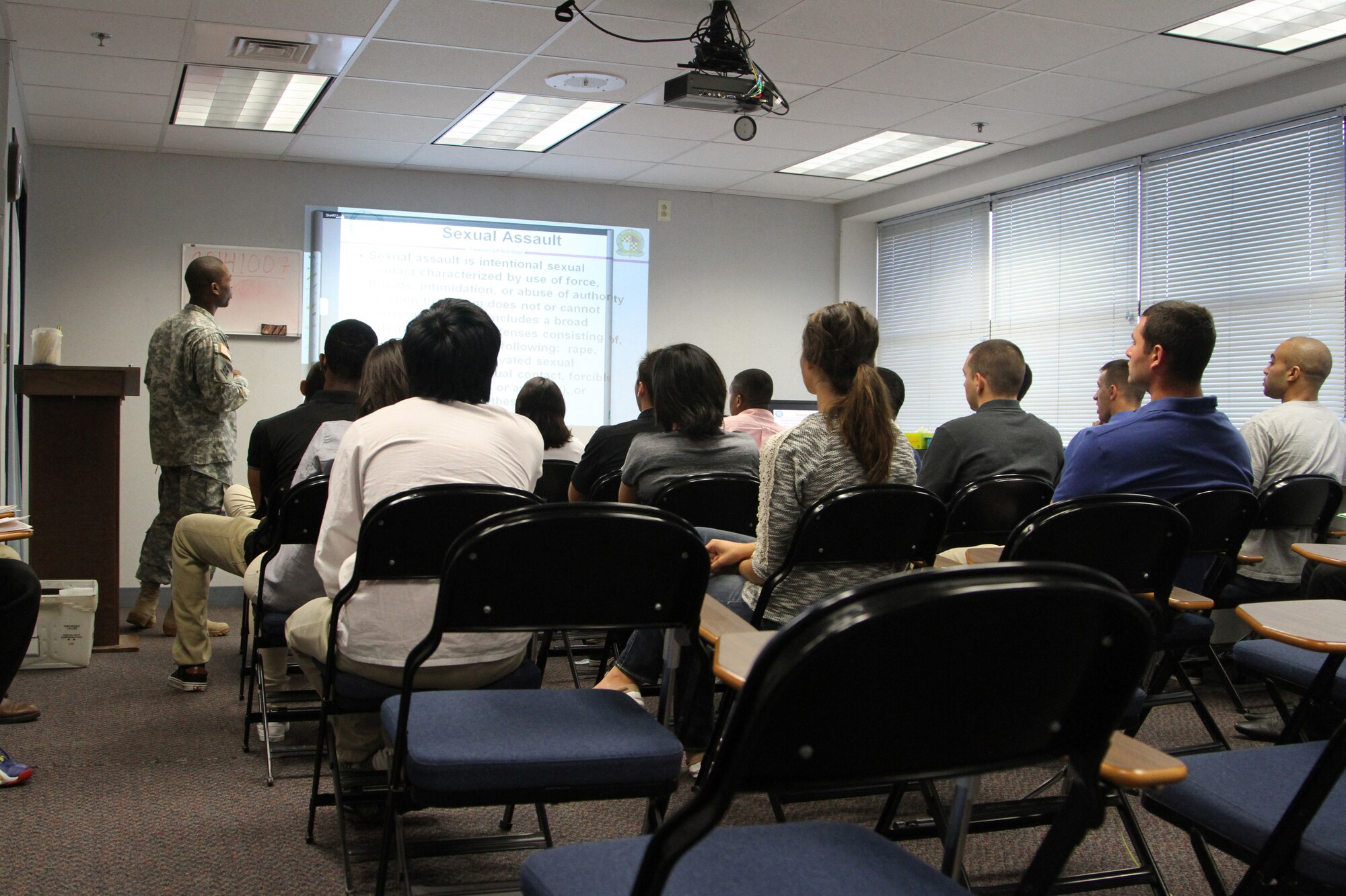 Applicants recieve an inprocessing briefing and a Sexual Harrassment Assualt Response Prevention class at the Military Entrance Processing Station on Joint Base McGuire-Dix-Lakehurst, N.J., Oct. 7, 2014. (U.S. Army photo by Sgt. Richard W. Hoppe/Released)