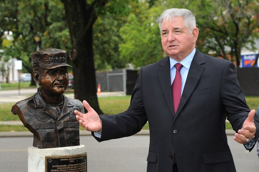 Former Air Force Chief of Staff Gen. Ronald R. Fogleman gives a speech during a bust dedication, which recognized him as the 23rd inductee into the Airlift/Tanker Association's Hall of Fame Oct. 9, 2014, at Scott Air Force Base, Illinois. Fogleman served as the Air Force Chief of Staff, U.S. Transportation Command, and Commander, Air Mobility Command, when it was a dual-hatted position. Fogleman also served as a fighter pilot, where he flew 315 combat missions and acquired more than 800 combat. His was recognized with the award of the Silver Star, two Distinguished Flying Crosses and received the Purple Heart for injuries he received while ejecting from his crippled aircraft. (U.S. Air Force photo/Senior Airman Tristin English)