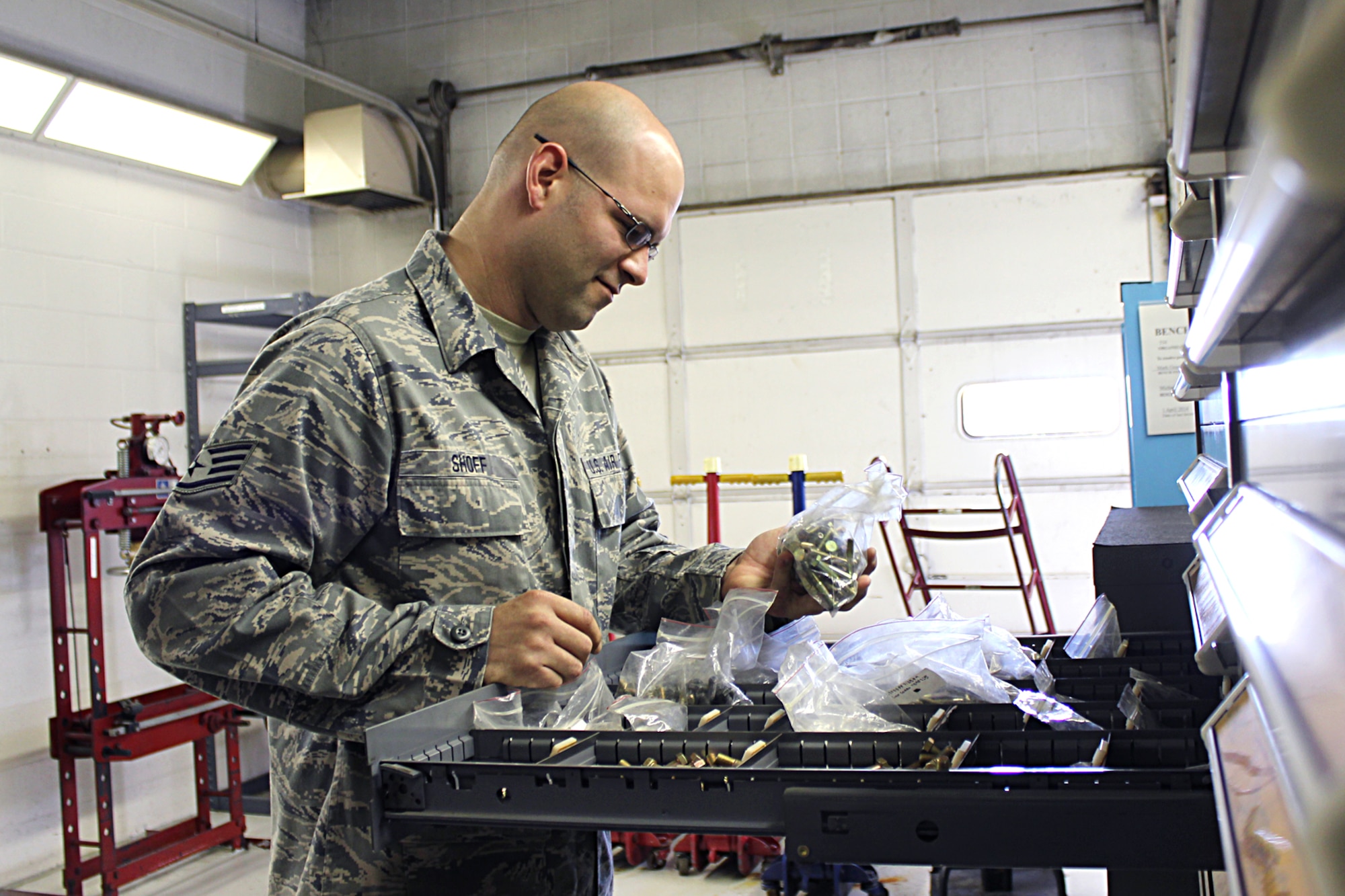 Staff Sgt. Michael Shoff works in the aerospace ground equipment shop -- known as "AGE" -- for the 191st Maintenance Squadron at Selfridge Air National Guard Base, Mich., Oct. 9, 2014. AGE specialists needs to be well-rounded mechanics as they maintain, repair and troubleshoot about two dozen different types of equipment used to support aircraft operations, including electronics, pneumatics, power generation, heating & cooling and more. The 191st MXS supports KC-135 Stratotanker operations at Selfridge. (U.S. Air National Guard photo by Tech. Sgt. Dan Heaton)