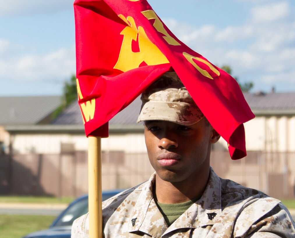 Cpl. Andre Hawkins, Marine Transport Squadron Andrews’ training NCO in-charge, stands at attention during sword and guidon training on Joint Base Andrews, Md., Oct. 8, 2014. The training is part of the first joint Corporals Course here. It is designed to provide students with the knowledge and skills necessary to be successful small-unit leaders. (U.S. Air Force photo/Airman 1st Class Ryan J. Sonnier)
