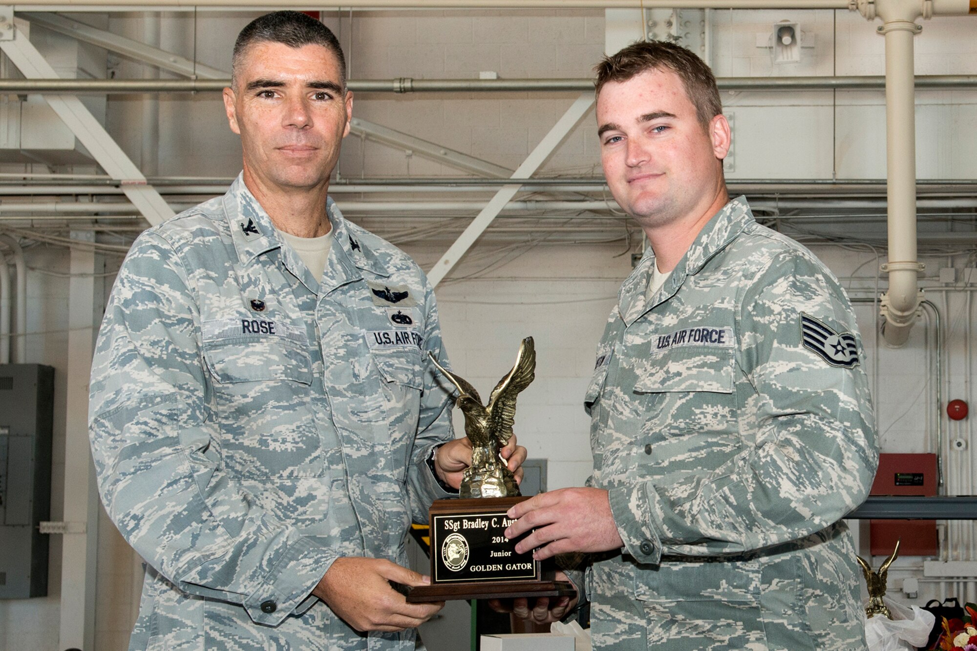 U.S. Air Force Staff Sgt. Bradley Austin is selected to receive the Junior Golden Gator Award during the Gatorfest Awards Ceremony on Oct. 4, 2014, Barksdale Air Force Base, La. Austin is recognized as one of the 307th Bomb Wing's maintenance professionals of the year who has made the greatest contribution within his career field in the maintenance community. (U.S. Air Force photo by Master Sgt. Greg Steele/Released)