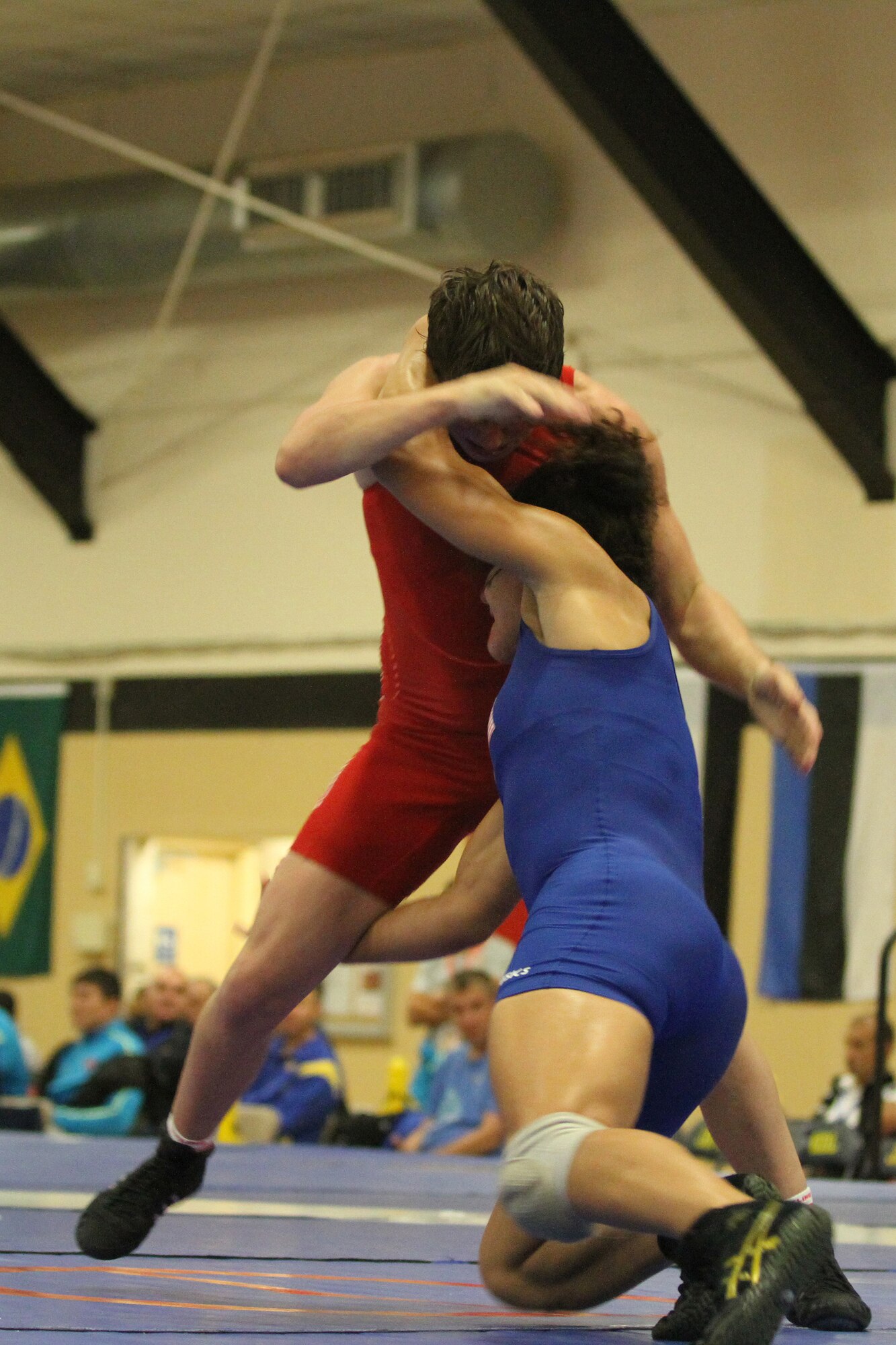 Anna ZWIRYDOWSKA (Poland) wins by decision over Melissa APODACA (U.S.A.) (Decision 6-1) during the Conseil International Du Sport – International Military Sports Council - World Wrestling Championship held at the Griffith Field House on Joint Base McGuire-Dix-Lakehurst, N.J., Oct. 3, 2014. The CISM is a multinational military sorts organization that aspires to unite competitors, and their nations, through sport. (U.S. Army photo by Sgt. Christopher Moore/Released)