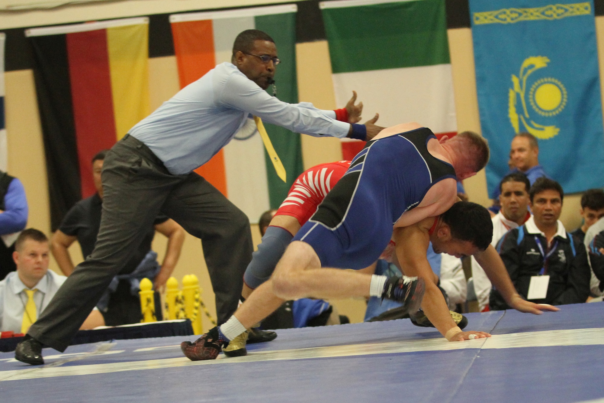Aaron Kalil (USA) competes against Tsogbaatar Damdinbazar (Mongolia) during the the Conseil International Du Sport – International Military Sports Council - World Wrestling Championship held at the Griffith Field House on Joint Base McGuire-Dix-Lakehurst, N.J., Oct. 3, 2014. The CISM is a multinational military sports organization that aspires to unite competitors, and their nations, through sport. (U.S. Army photo by Sgt. Christopher Moore/Released)