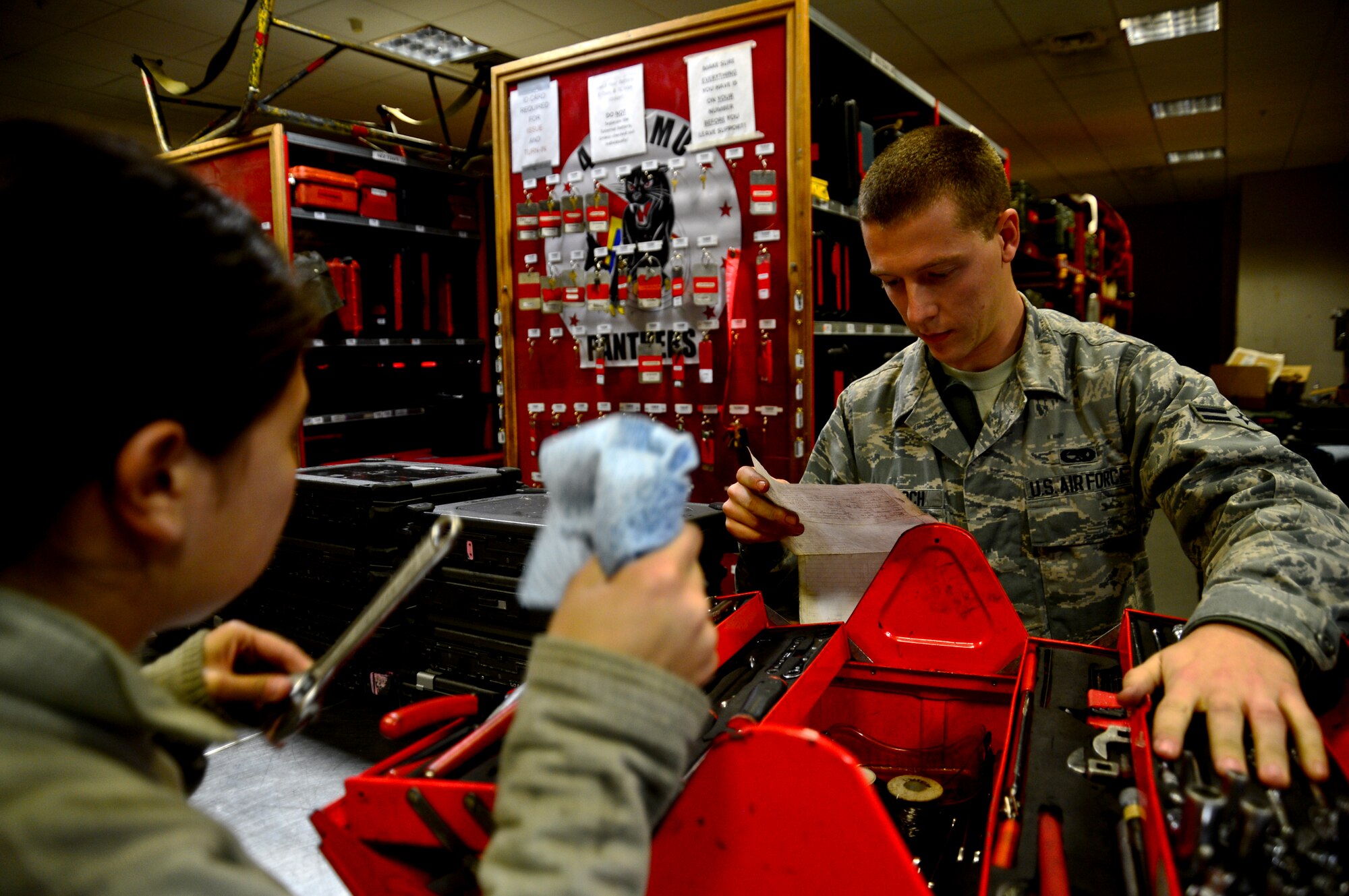 Airman 1st Class Brett Malloch, 48th Aircraft Maintenance Squadron, Assistant Dedicated Crew Chief currently working as support, checks in an electrical and environmental tool box at Royal Air Force Lakenheath, England, Oct. 9, 2014. Malloch was nominated for a Liberty Spotlight because he displays the core value of Service Before Self. (U.S. Air Force photo by Airman 1st Class Erin R. Babis/Released)