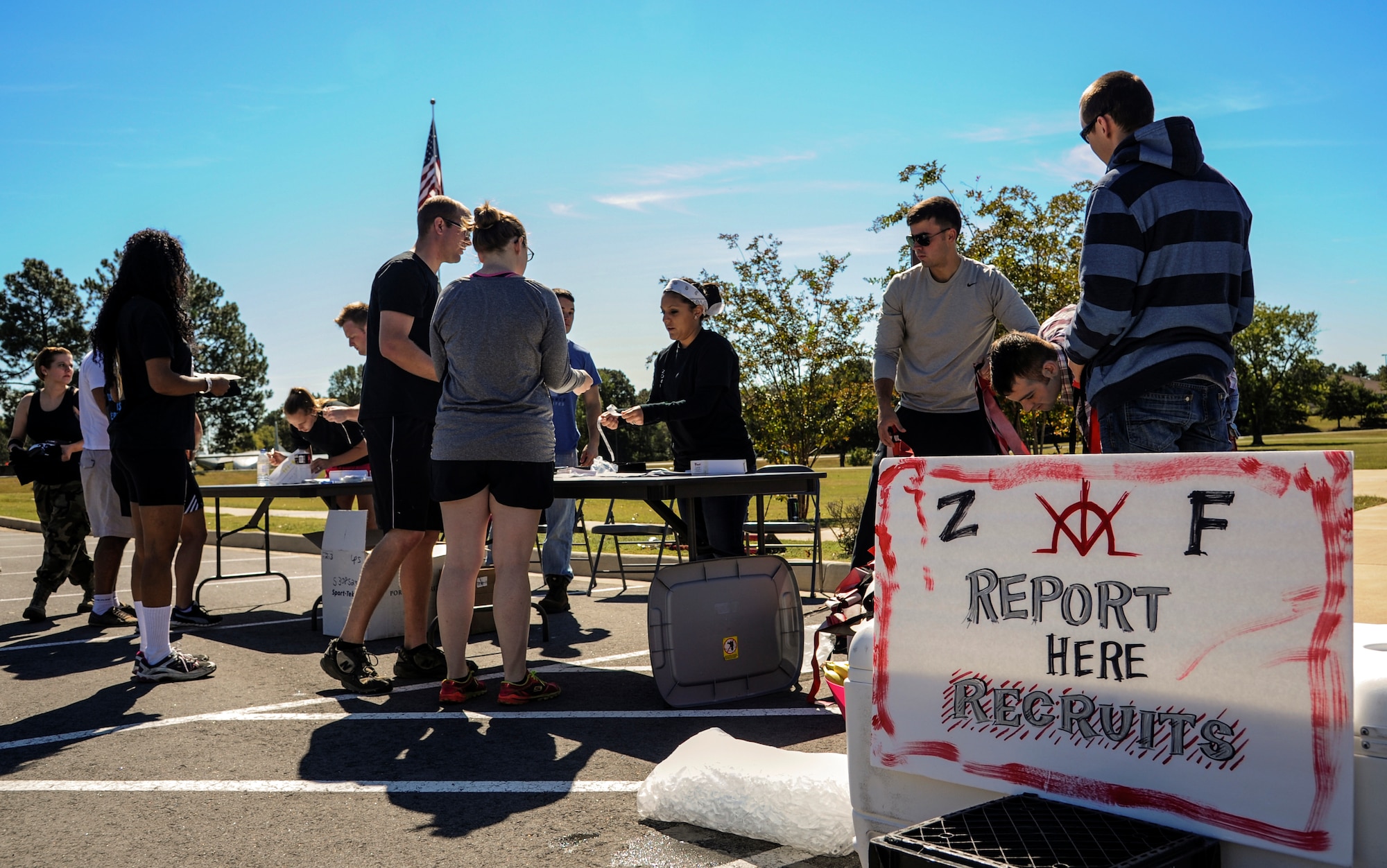 Men and women sign in for the Zombie Resistance Run Oct. 4, 2014, at Little Rock Air Force Base, Ark. This year, the event tested “recruits” on their abilities to outrun zombies through a five-mile course. (U.S. Air Force photo by Airman 1st Class Harry Brexel) 