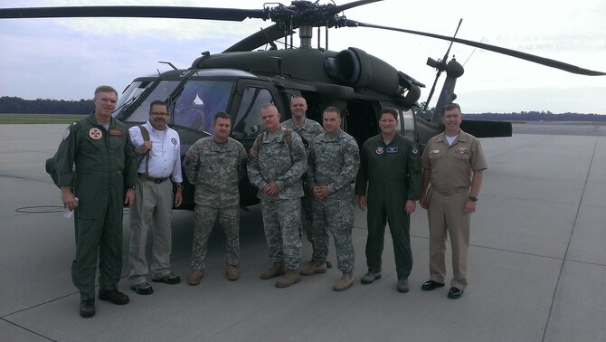 Col. J. Chris Whitmire, an Emergency Preparedness Liaison Officer to the state of North Carolina, second from the right, with fellow state EPLOs in front of a Blackhawk helicopter. Whitmire also serves his home state as an elected official and was voted into the North Carolina House of Representatives in 2012.