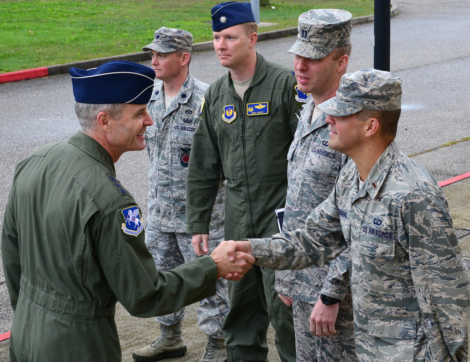 Lt. Gen. Darryl Roberson, 3rd Air Force commander, greets Team Aviano Airmen outside the wing headquarters building, Oct. 8, 2014, at Aviano Air Base, Italy. Roberson visited several units and held an all call during his first visit as the 3rd Air Force commander. (U.S. Air Force photo/Senior Airman Matthew Lotz)