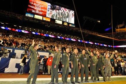 Lt. Col. Mike Birkeland (right) and Senior Master Sgt. Eddie Diaz of the Florida Air National Guard's Detachment 1, 125th Fighter Wing, stand outside of Sun Life Stadium in Miami where Super Bowl XLIV will be held Sunday, Feb. 7, 2010. The Florida Air National Guard is providing the flyover for the Super Bowl's pre-game show, and Birkeland and Diaz will be part of the ground crew supporting the event.