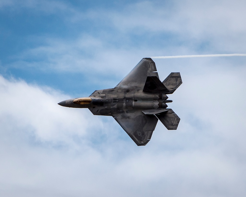 An F-22 Raptor demonstrates its maneuverability during the Wings Over the Pacific air show Sept. 28, 2014, at Joint Base Pearl Harbor-Hickam, Hawaii. The Raptor’s sophisticated aero design, advanced flight controls, thrust vectoring, and high thrust-to-weight ratio provide the capability to outmaneuver all current and projected aircraft. (U.S. Air Force photo/Capt. Raymond Geoffroy)
