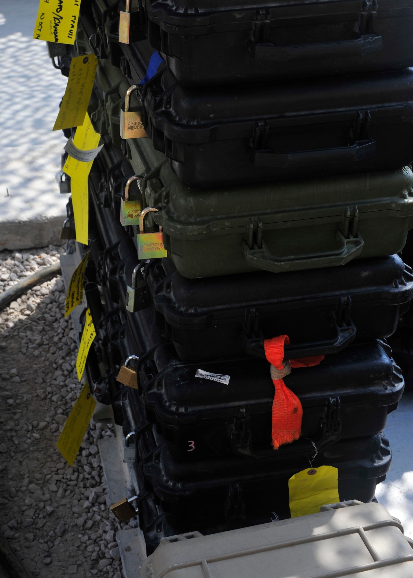 Weapons cases are stacked at the armory at Al Udeid Air Base, Qatar, Oct 7. 24, 2014. The Airmen at the armory guard, inspect, issue and retrieve millions of dollars’ worth of equipment 24 hours a day, seven days a week. (U.S. Air Force photo by Senior Airman Colin Cates) 