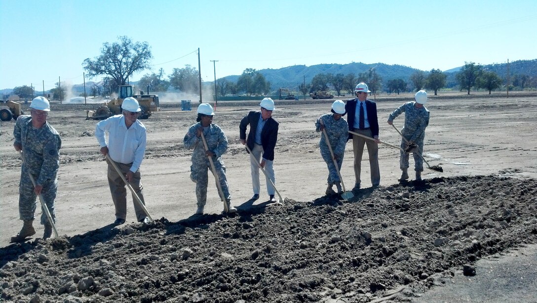 The U.S. Army Corps of Engineers Sacramento District chief of construction operations, Norbert Suter (second from right), joins others from Fort Hunter Liggett and the Army Reserve at the groundbreaking for a $61 million, environmentally-friendly training complex Oct. 7. The complex will consist of buildings and facilities that will be LEED-Silver certifiable when completed. (U.S. Army photo by Jon Revolinsky/Released)