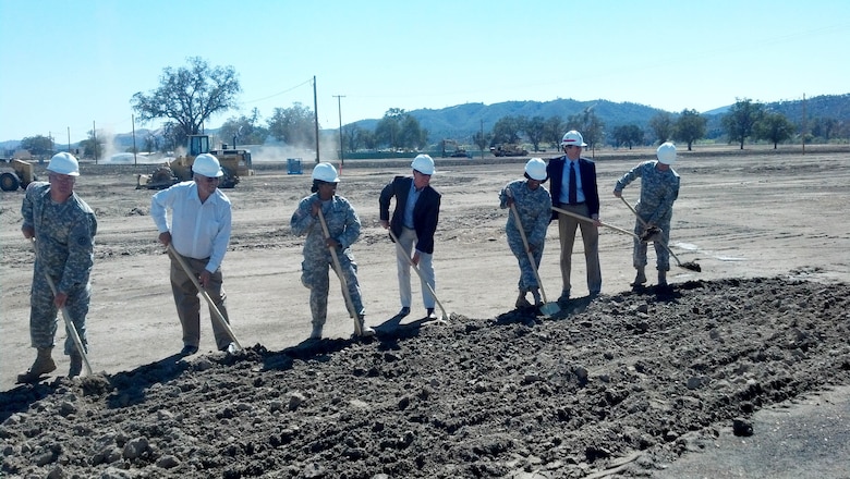 The U.S. Army Corps of Engineers Sacramento District chief of construction operations, Norbert Suter (second from right), joins others from Fort Hunter Liggett and the Army Reserve at the groundbreaking for a $61 million, environmentally-friendly training complex Oct. 7. The complex will consist of buildings and facilities that will be LEED-Silver certifiable when completed. (U.S. Army photo by Jon Revolinsky/Released)