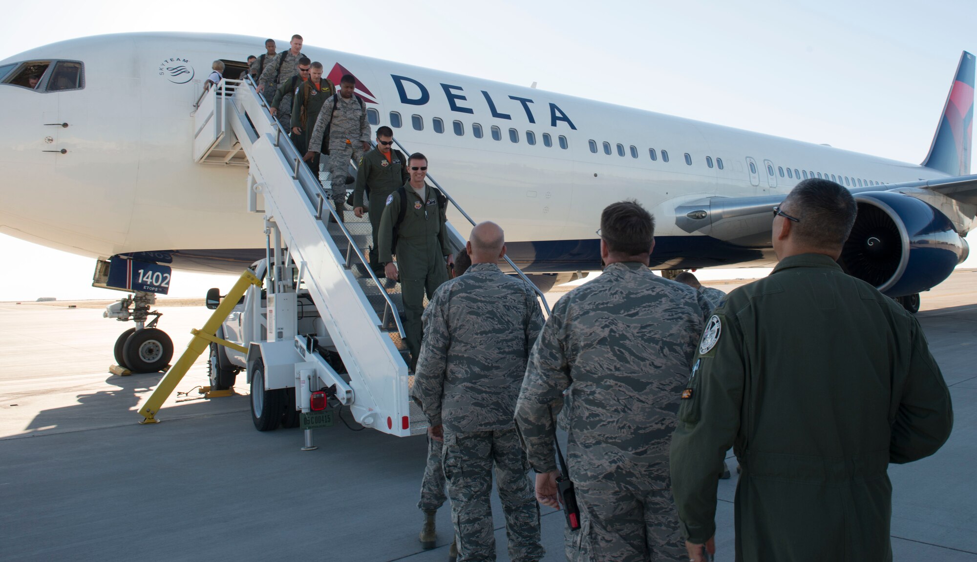 Base leadership welcomes Airmen returning to Mountain Home Air Force Base, Idaho, Oct. 10, 2014. The 391st Fighter Squadron deployed more than 300 Airmen for a six month Asia-Pacific Region deployment. (U.S. Air Force photo by Airman 1st Class Malissa Lott/RELEASED)