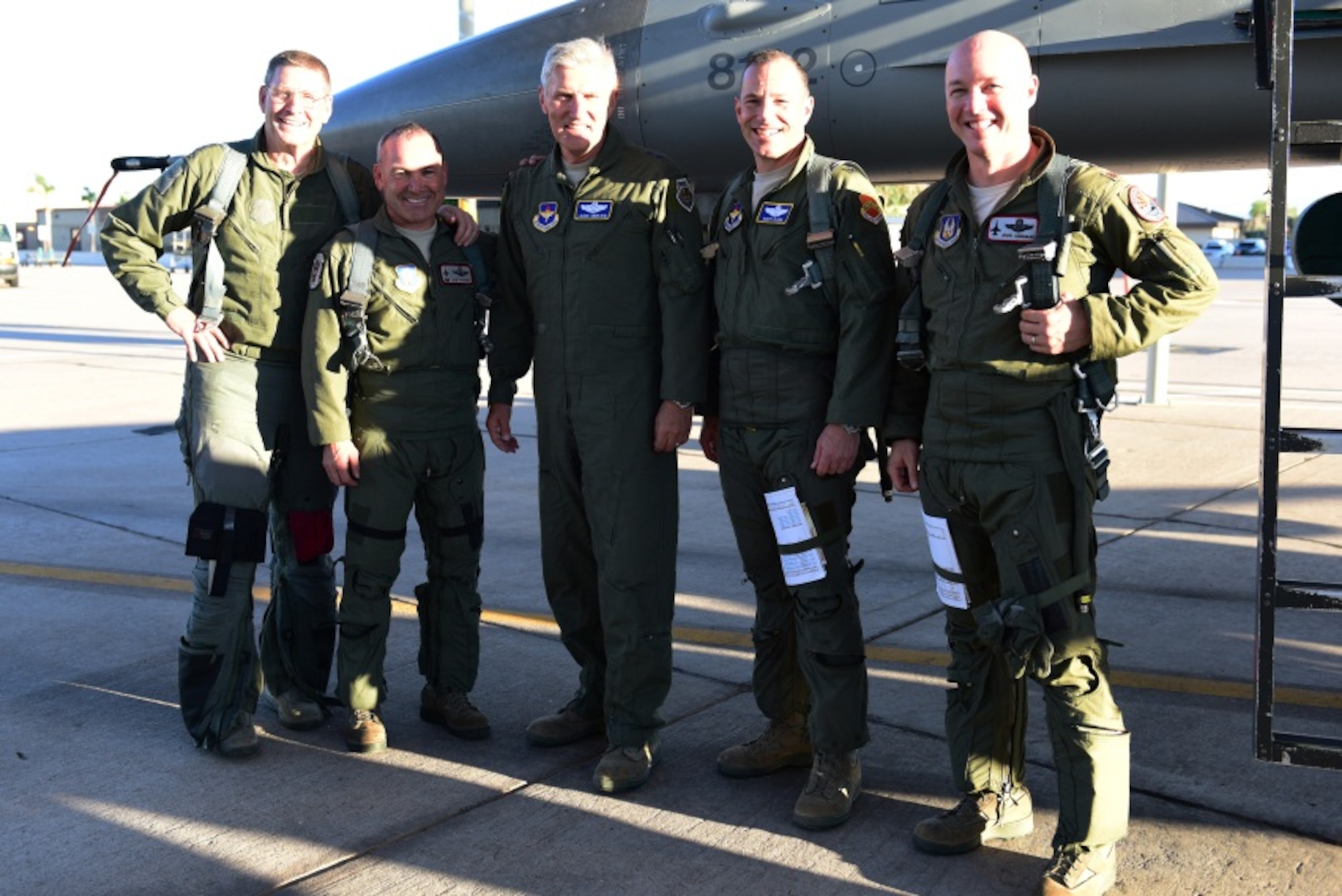 (From left) General Robin Rand, commander, Air Education and Training Command, Col. Kurt Gallegos, 944th Fighter Wing commander, Maj. Gen. Lance Undhjem, mobilization assistant to the commander, AETC, Brig. Gen. Scott Pleus, 56th Fighter Wing commander, and Maj. Ryan Savageau, 69th Fighter Squadron assistant director of operations, pose for a photo after returning from a fini-flight at Luke Air Force Base, Ariz. Oct. 9, 2014. The flight was in honor of Undhjem who flew 4,000 hours during a span of 39 years in the United States Air Force. (U.S. Air Force photo/Staff Sgt. Lausanne Kinder, 944th Fighter Wing Public Affairs)