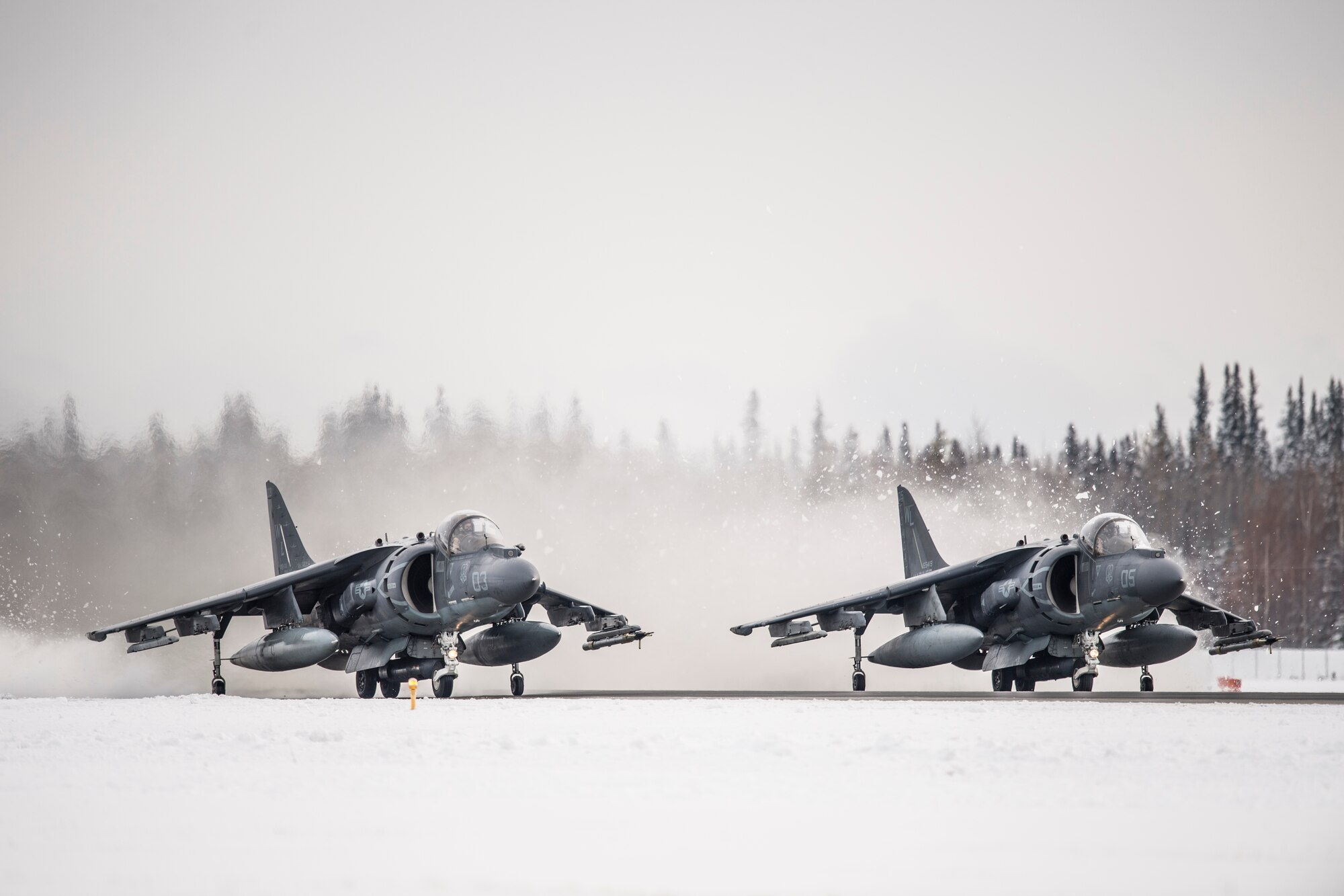 U.S. Marine Corps AV-8B Harrier ground attack aircraft assigned to Marine Fighter Attack Squadron 311, Marine Corps Air Station Yuma, Ariz., take off for a sortie at Eielson Air Force Base, Alaska, Oct. 6, 2014, during RED FLAG-Alaska 15-1. RF-A is a series of Pacific Air Forces commander-directed field training exercises for U.S. and partner nation forces, providing combined offensive counter-air, interdiction, close air support and large force employment training in a simulated combat environment. (U.S. Air Force photo by Senior Airman Peter Reft/Released)