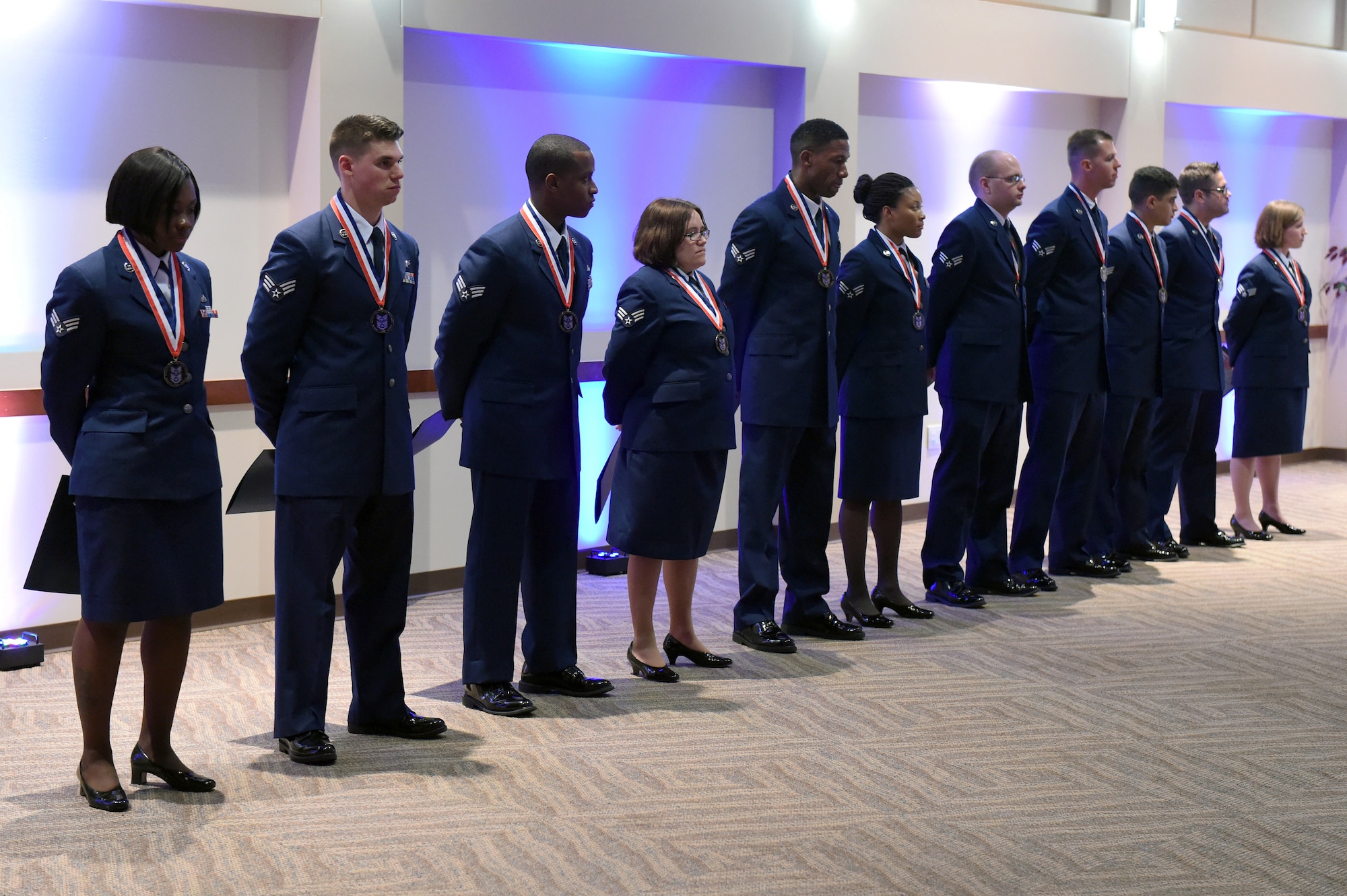 Buckley Airman Leadership School Class 14-G stand together after their graduation Oct. 9, 2014, at the Leadership Development Center on Buckley Air Force Base, Colo. This graduation represents an important part of the enlisted force professional military education, teaching valuable skills required for supervisors. (U.S. Air Force photo by Airman Emily E. Amyotte/Released)
