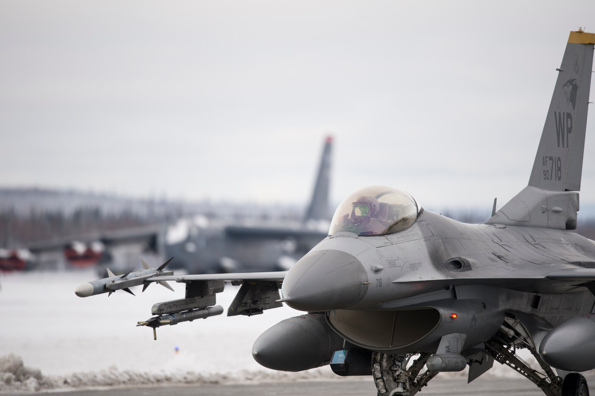 A U.S. Air Force F-16 Fighting Falcon fighter aircraft assigned to the 35th Fighter Squadron, Kunsan Air Base, South Korea, taxis down a runway for a sortie at Eielson Air Force Base, Alaska, Oct. 6, 2014, during RED FLAG-Alaska 15-1. RF-A is a series of Pacific Air Forces commander-directed field training exercises for U.S. and partner nation forces, providing combined offensive counter-air, interdiction, close air support and large force employment training in a simulated combat environment. (U.S. Air Force photo by Senior Airman Peter Reft/Released)