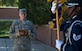 Airman 1st Class Brandon Hearne, United States Air Force Honor Guard ceremonial guardsman, evaluates Staff Sgt. Dawn Egbeule, Honor Guard Color Flight supervisor, during practice drill at Joint Base Anacostia-Bolling, Washington, District of Colombia. Hearne was recognized as Warrior of the Week for the week of Oct. 8, 2014. (U.S. Air Force photo/ Senior Airman Mariah Haddenham)