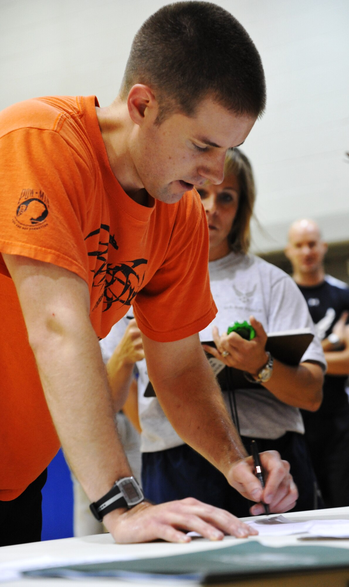 Warner tests his memory by filling out target points he saw on a computer during the mental and phyiscal training obstacle course. "It's very important for us to have the discipline of the mind and body. It's crucial," said Warner.
