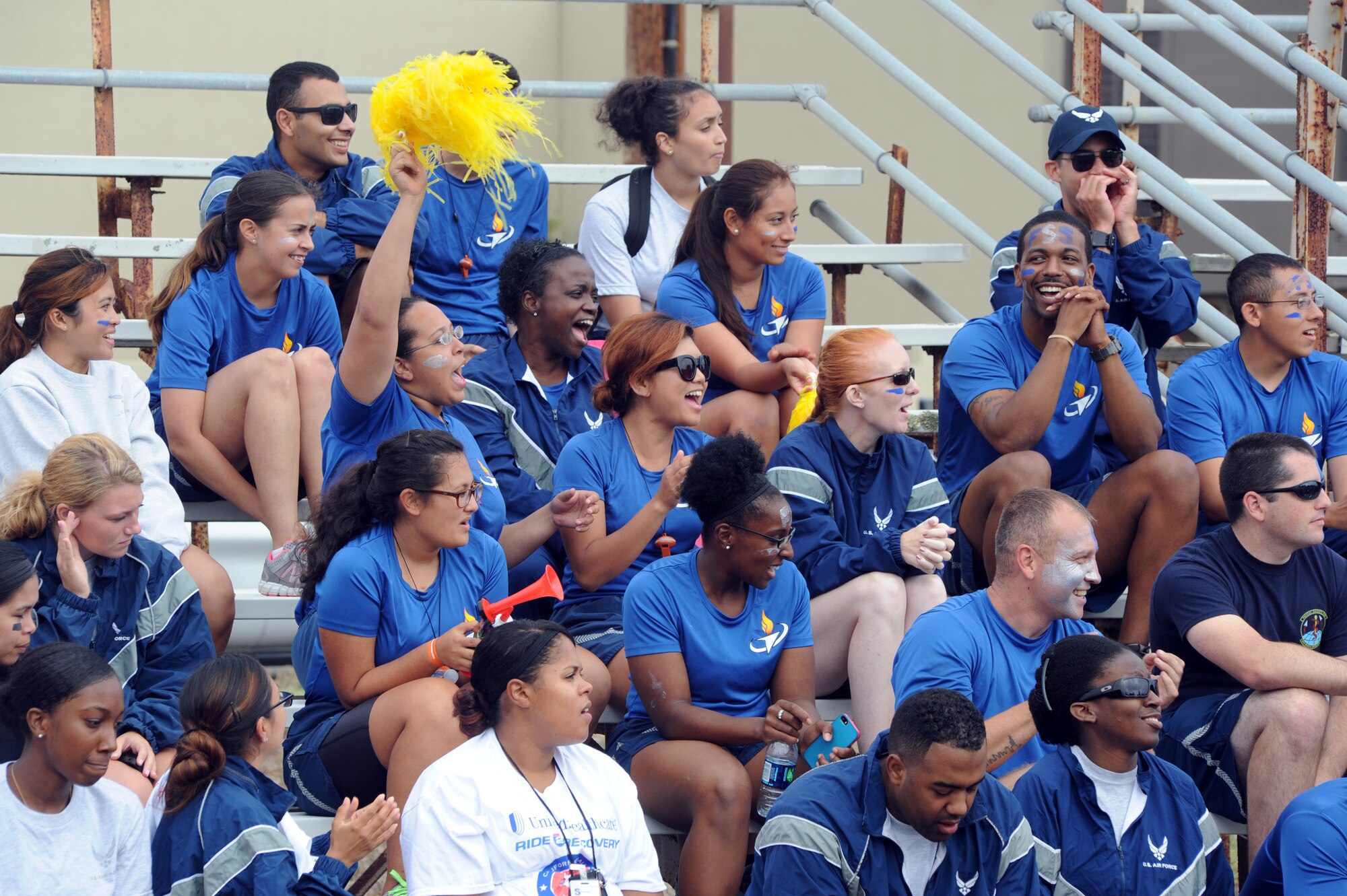 Members of the 30th Force Support Squadron enjoy events while cheering for their team during Wingman Day, Oct. 9, 2014, Vandenberg AFB, Calif. Wingman Day is held twice a year to provide Airmen an opportunity to build morale and camaraderie through team-building exercises. (U.S. Air Force photo by Michael Peterson/Released)