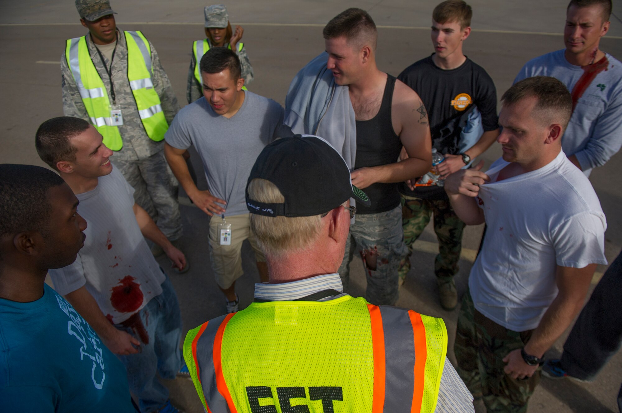 Wayne Paddock, 49th Wing inspector general, briefs victim participants on their various roles during an active shooter exercise at Holloman Air Force Base, N.M., Oct. 9. Holloman exercises to maintain readiness in order to respond to emergencies such as active shooters. Members from the 49th Security Forces Squadron, 49th Civil Engineer Squadron and the 49th Medical Group were able to quickly respond to the exercise scenario, neutralize the threats and evacuate the victims. (U.S. Air Force photo by Airman 1st Class Aaron Montoya / Released)