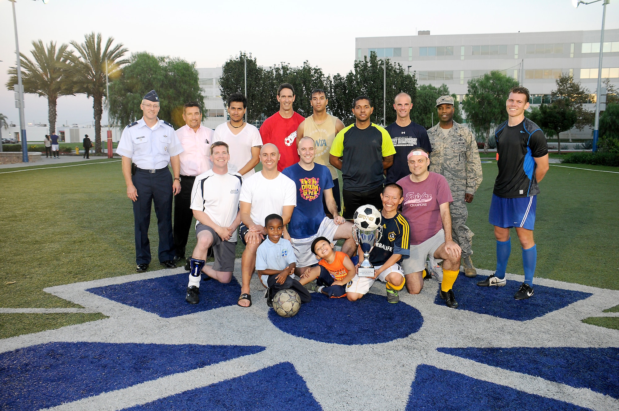 Space and Missile System Center (SMC) Remote Sensing Systems Directorate (RS) team “A” beat out SMC Launch and Range Systems Directorate (LR) in the Los Angeles Air Force Base soccer playoffs, Oct 8, 2014. LR took the first game 3 to 1 over RS but RS came back to force the playoff and won 2 to 1 over LR for the Championship win. Photo by Joe Juarez