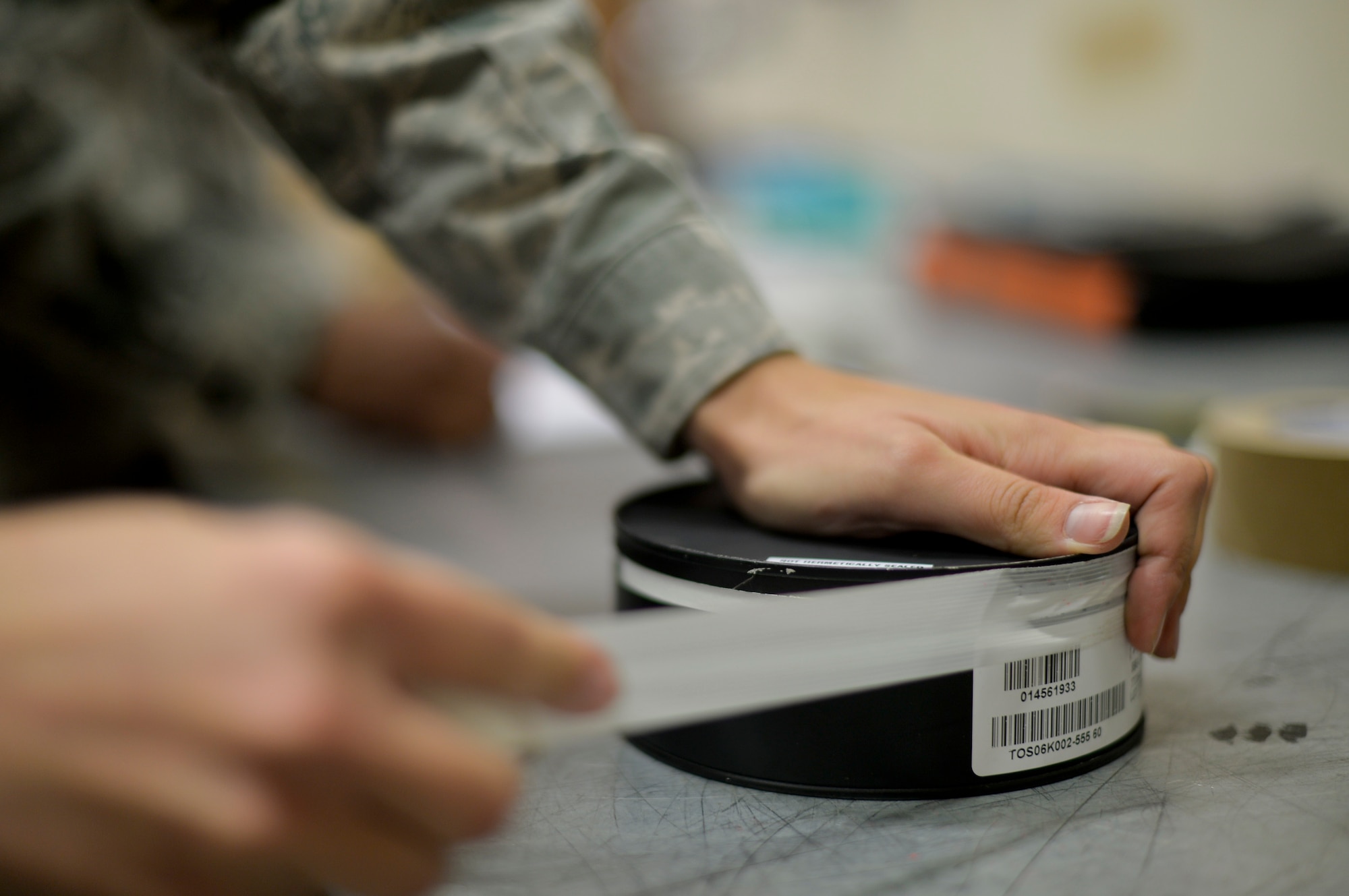 An 86th Munitions Squadron conventional maintenance crew member, packages a BBU-35 impulse cartridge on Ramstein Air Base, Germany, Sep. 30, 2014. The 86th Munitions Squadron supports U.S. Air Forces in Europe and three combatant commands by acting as a supply depot, housing munitions that get shipped to support worldwide operations. (U.S. Air Force photo/Airman 1st Class Michael Stuart)