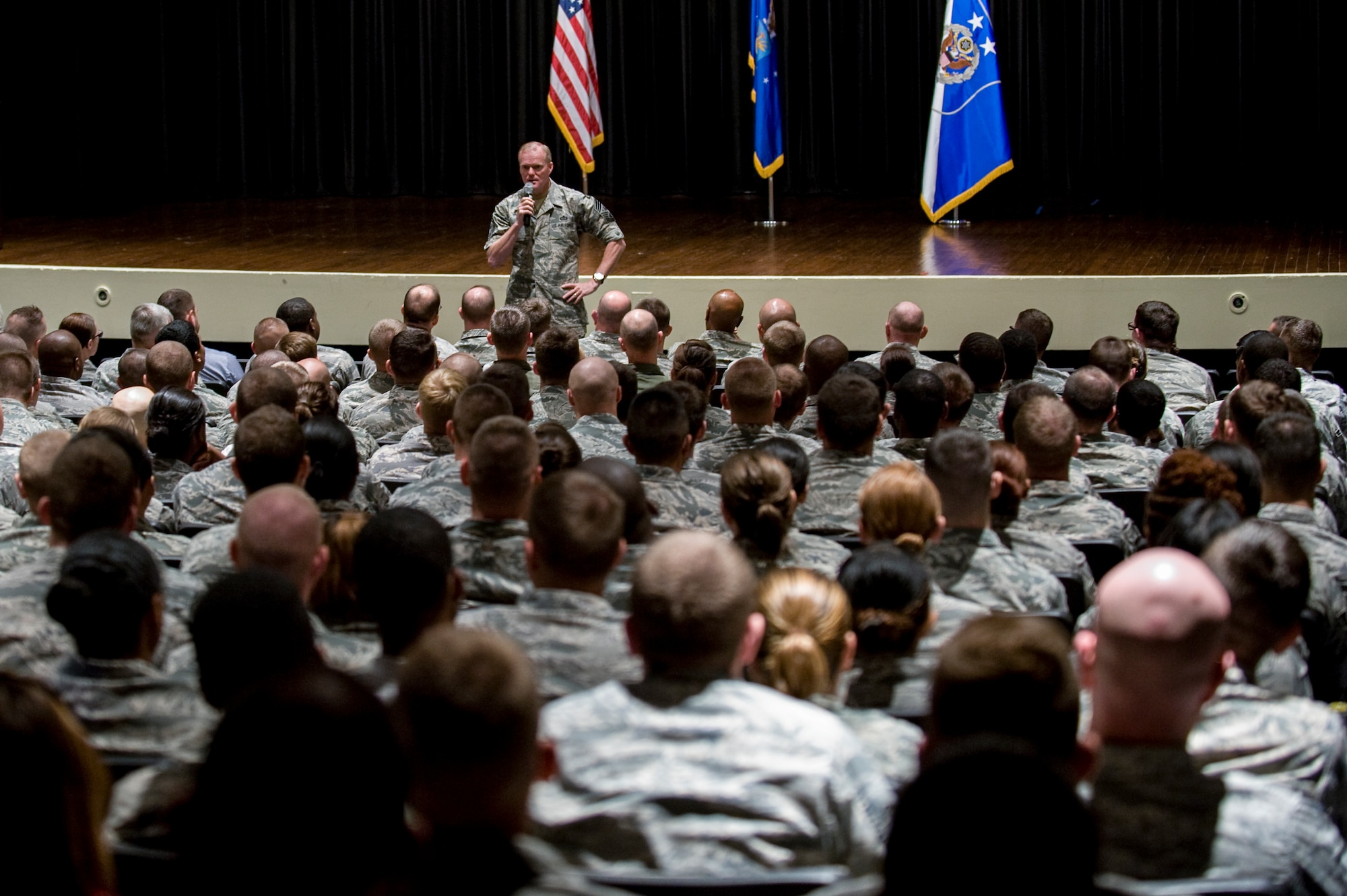 Chief Master Sgt. of the Air Force James Cody addresses the crowd during an all call at Seymour Johnson Air Force Base, North Carolina, Oct. 9. While at Seymour Johnson AFB, Cody paid visits to several units throughout the 4th Fighter Wing as well as the base’s Reserve component, the 916th Air Refueling Wing. During his all calls, Cody discussed force management, professional military education, the enlisted evaluation and promotion system, and the challenges ahead for the Air Force. (U.S. Air Force photo/Airman 1st Class Aaron Jenne)