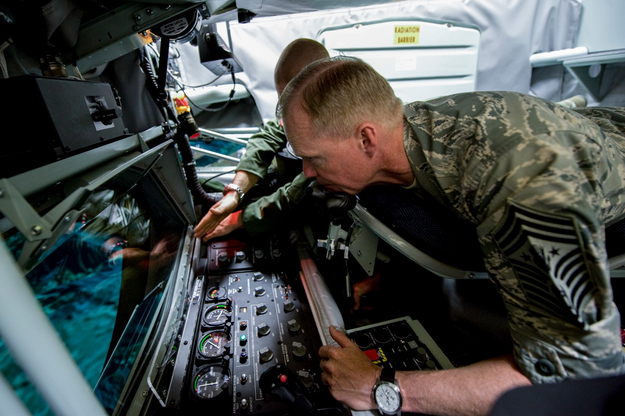 Chief Master Sgt. of the Air Force James Cody participates in a KC-135 Stratotanker refueling boom operator simulation with members of the 916th Air Refueling Wing at Seymour Johnson Air Force Base, North Carolina, Oct. 10. While at Seymour Johnson AFB, Cody paid visits to several units throughout the 4th Fighter Wing as well as the base’s Reserve component, the 916th ARW. (U.S. Air Force photo/Airman 1st Class Aaron Jenne)