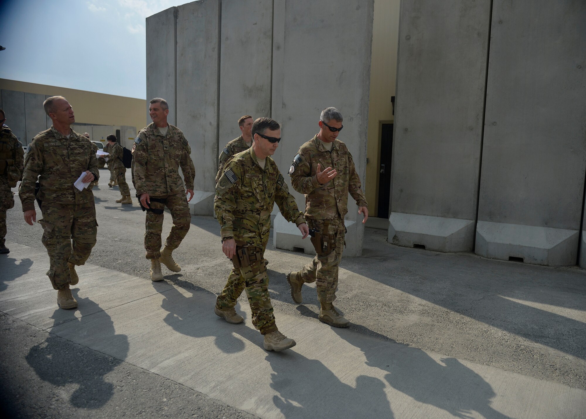 U.S. Air Force Lt. Gen. John Hesterman, U.S. Air Forces Central Command commander, walks with 455th Expeditionary Maintenance Group leadership at Bagram Airfield, Afghanistan Oct. 7, 2014. Hesterman visited several units and thanked Airmen for their service.  (U.S. Air Force photo by Staff Sgt. Evelyn Chavez/Released)