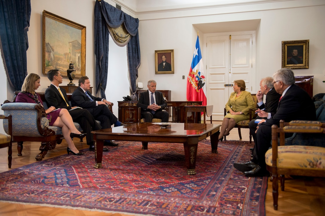 U.S. Defense Secretary Chuck Hagel meets with Chilean President Michelle Bachelet at La Moneda, the presidential palace, in Santiago, Chile, Oct. 11, 2014.