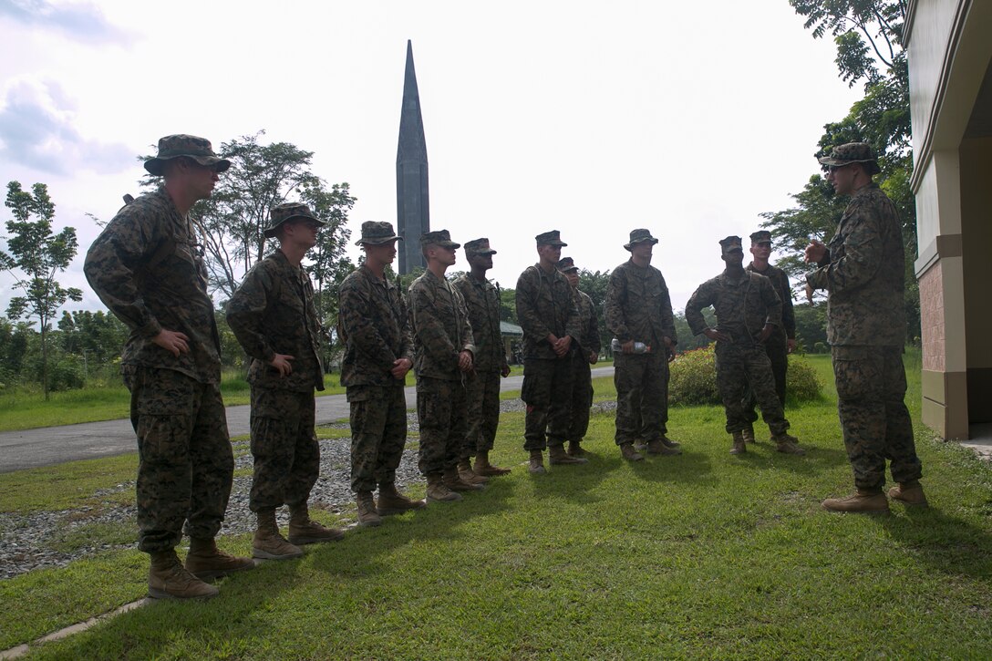U. S. Marines listen as U.S. Navy Lt. Yonatan Warren explains the history of the Bataan Death March during Amphibious Landing Exercise 15, Oct. 8, 2014. More then 100 Marines visited the memorial over two days to learn more about the events of World War II that occurred in the Philippines. PHIBLEX is an annual, bilateral training exercise conducted by members of the Armed Forces of the Philippines alongside U.S. Marine and Navy forces focused on strengthening the partnership and relationships between the two nations across a range of military operations including disaster relief and complex expeditionary operations. Warren is the chaplain with Combat Logistics Battalion 31, 31st Marine Expeditionary Unit.