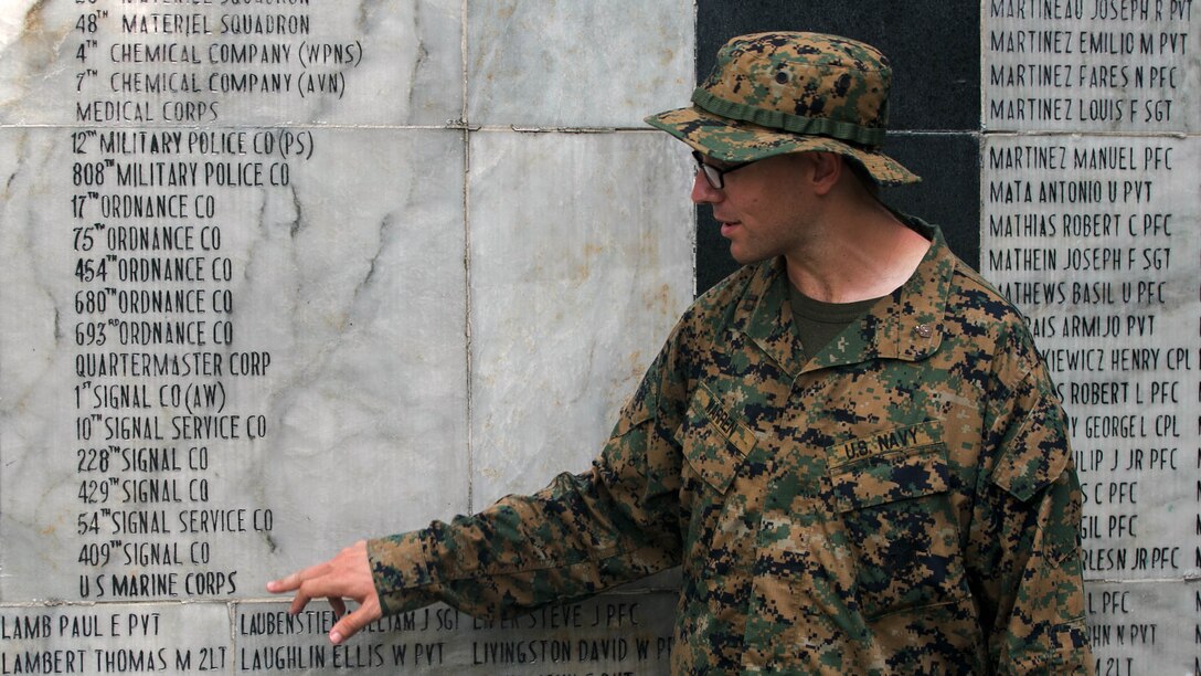 U.S. Navy Lt. Yonatan Warren explains the history of the Bataan Death March at the memorial wall during Amphibious Landing Exercise 15, Oct. 8, 2014. More then 100 Marines visited the memorial over two days to learn more about the events of World War II that occurred in the Philippines. PHIBLEX is an annual, bilateral training exercise conducted by members of the Armed Forces of the Philippines alongside U.S. Marine and Navy Forces focused on strengthening the partnership and relationships between the two nations across a range of military operations including disaster relief and complex expeditionary operations. Warren is the chaplain for Combat Logistics Battalion 31, 31st Marine Expeditionary Unit.