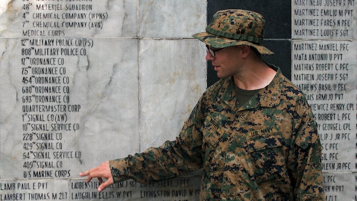 U.S. Navy Lt. Yonatan Warren explains the history of the Bataan Death March at the memorial wall during Amphibious Landing Exercise 15, Oct. 8, 2014. More then 100 Marines visited the memorial over two days to learn more about the events of World War II that occurred in the Philippines. PHIBLEX is an annual, bilateral training exercise conducted by members of the Armed Forces of the Philippines alongside U.S. Marine and Navy Forces focused on strengthening the partnership and relationships between the two nations across a range of military operations including disaster relief and complex expeditionary operations. Warren is the chaplain for Combat Logistics Battalion 31, 31st Marine Expeditionary Unit.