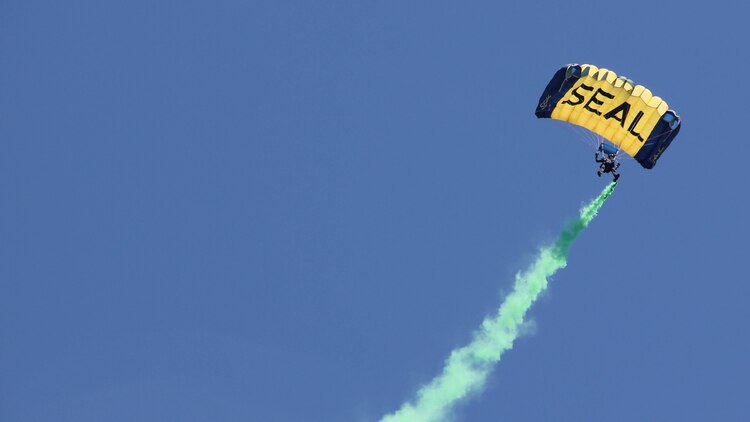 A Navy seal parachutes down to Marina Green, San Francisco, during the San Francisco Fleet Week 2014 Air Show, Oct. 11. In partnership with the U.S. Navy, the Marine Corps is a force perfectly designed and suited for both crisis response and maritime security.  No forces are more suitable to addressing emerging humanitarian assistance and disaster relief needs than naval amphibious forces.