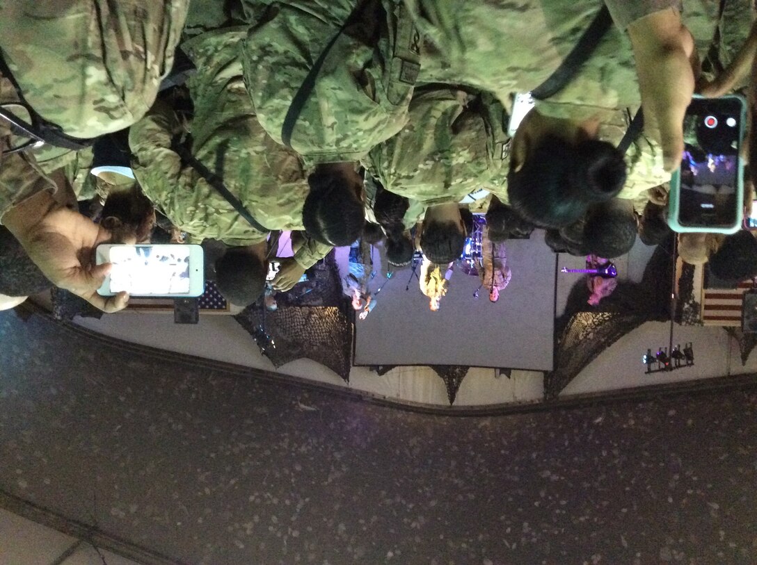 The AFCENT Band performed for more than 500 troops during a USO concert featuring Ginuwine , a Grammy-nominated and multi-platinum artist, Sept. 24, 2014.The band opened the show with well known pop and rock Top-40 hits.(U.S. Air Force Photo/Courtesy photo)