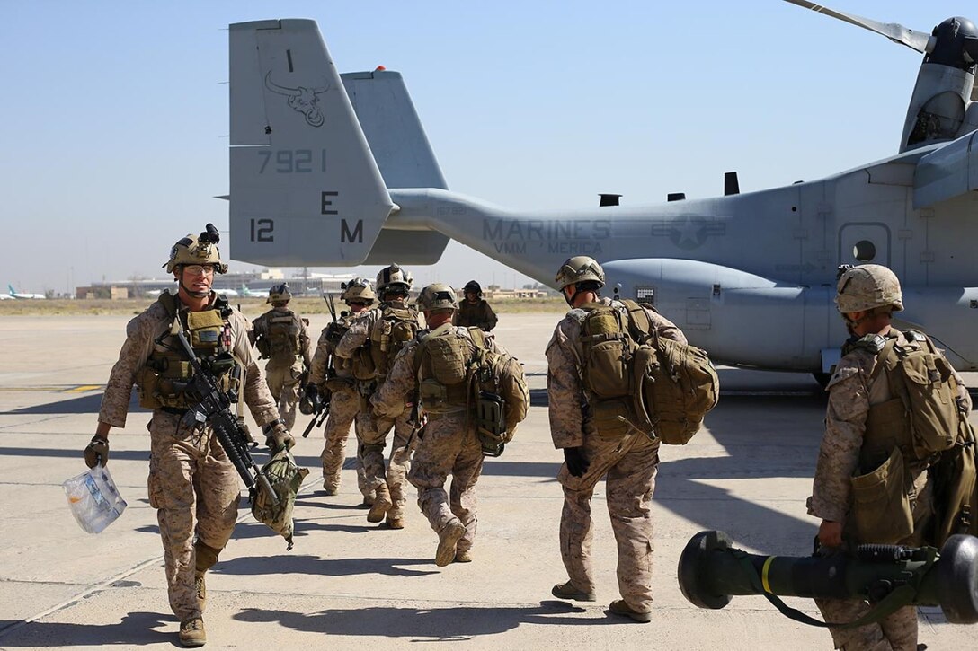 Marines with 11th Marine Expeditionary Unit (MEU) load into an MV-22B Osprey, with Marine Medium Tiltrotor Squadron 261, for re-posturing in support of potential missions. The 11th MEU is deployed with the Makin Island Amphibious Ready Group as a theater reserve and crisis response force throughout U.S. Central Command and the U.S. 5th Fleet area of responsibility. (U.S. Marine Corps photo by Lance Cpl. Evan R. White/Released)